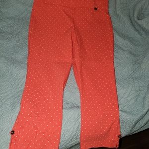 Coral and white polka-dot capri.